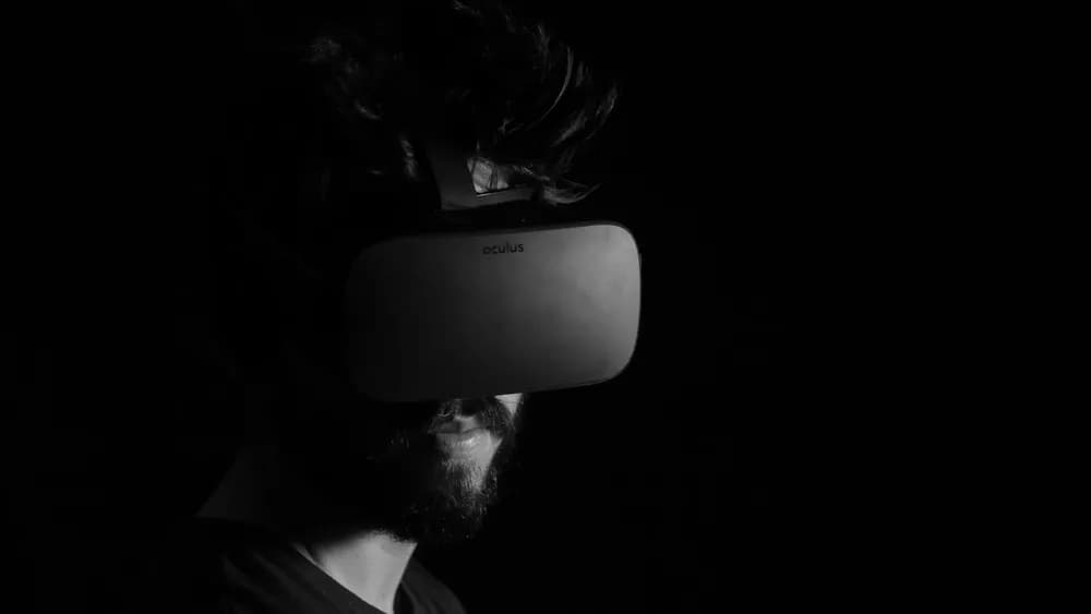 Dark portrait of a person in a VR headset